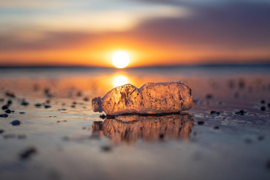 Plastic water bottle on beach